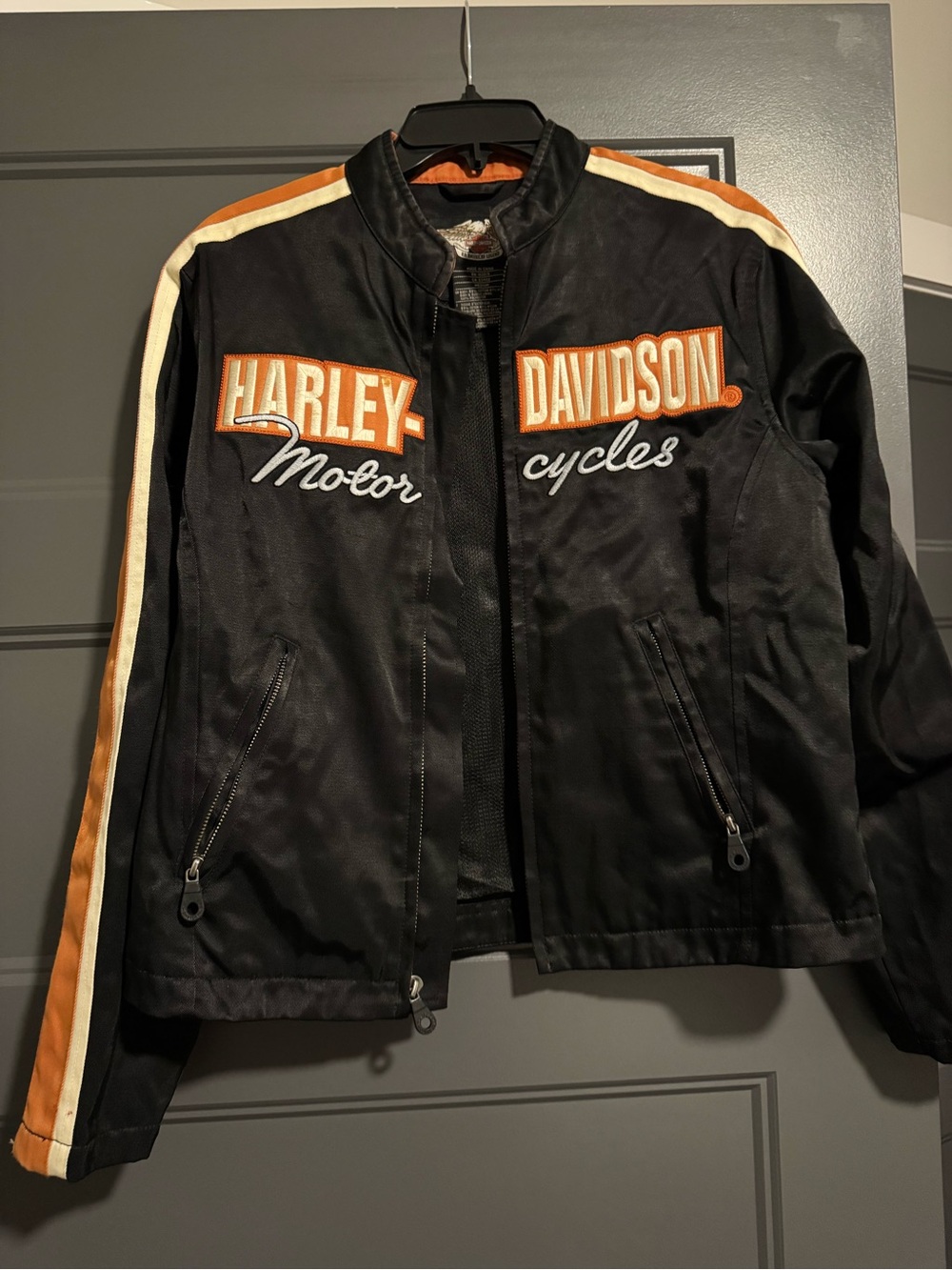 Harley-Davidson Black Jacket with Orange and Cream Sleeve Stripes